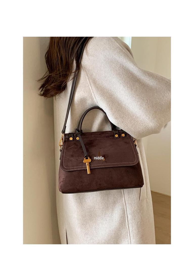 Koreanische Retro Damen Umhängetasche: Vielseitiges, Schlichtes, Atmosphärisches Design mit Großer Kapazität für den Täglichen Arbeitsweg.