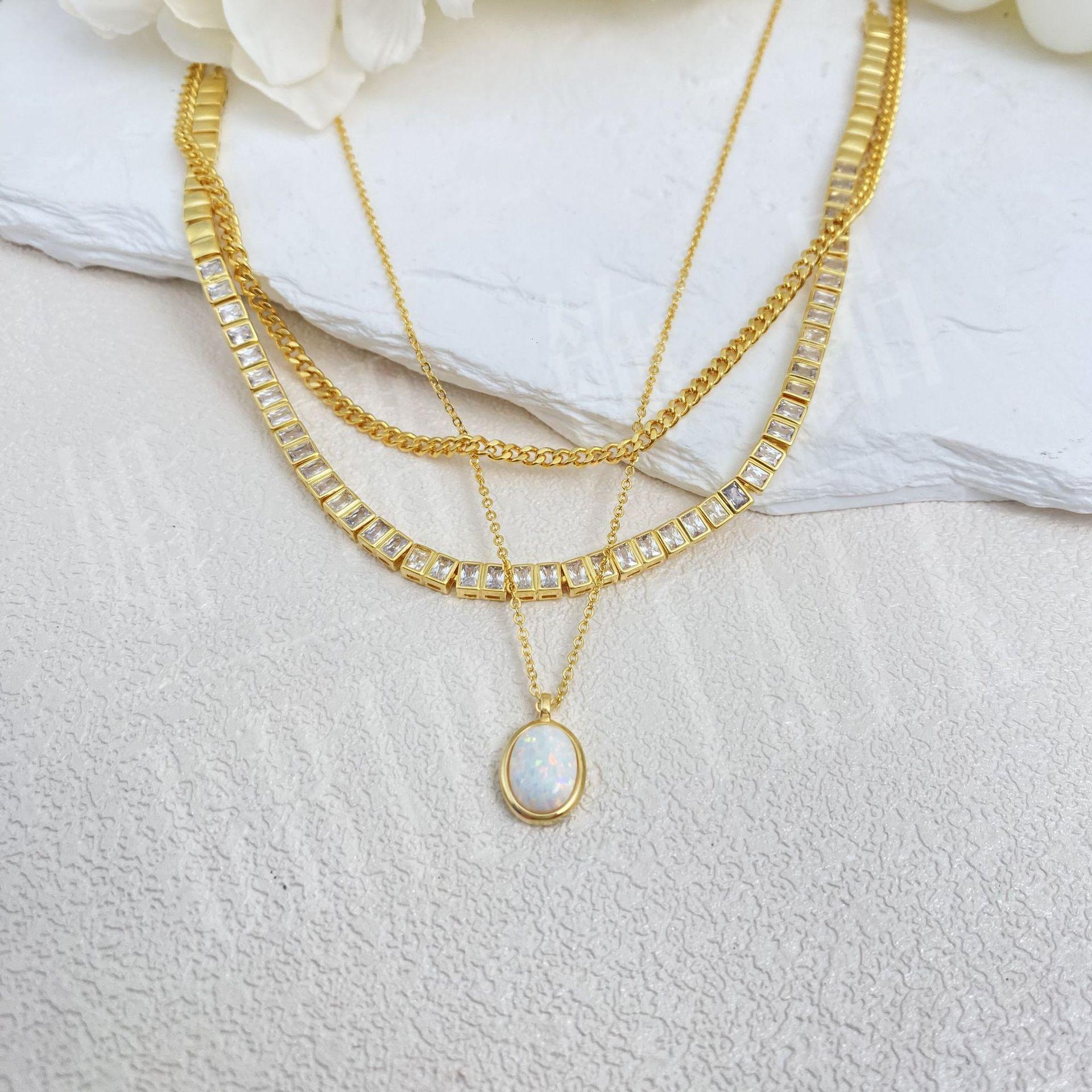 

Elegant Triple-Layer Micro-Paved Pendant Necklace золотой