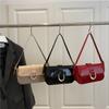 2025 New Shoulder Messenger Bag Trendy Foreign Feeling Bag Women's Retro Red Horseshoe Buckle Fashion Underarm Bag