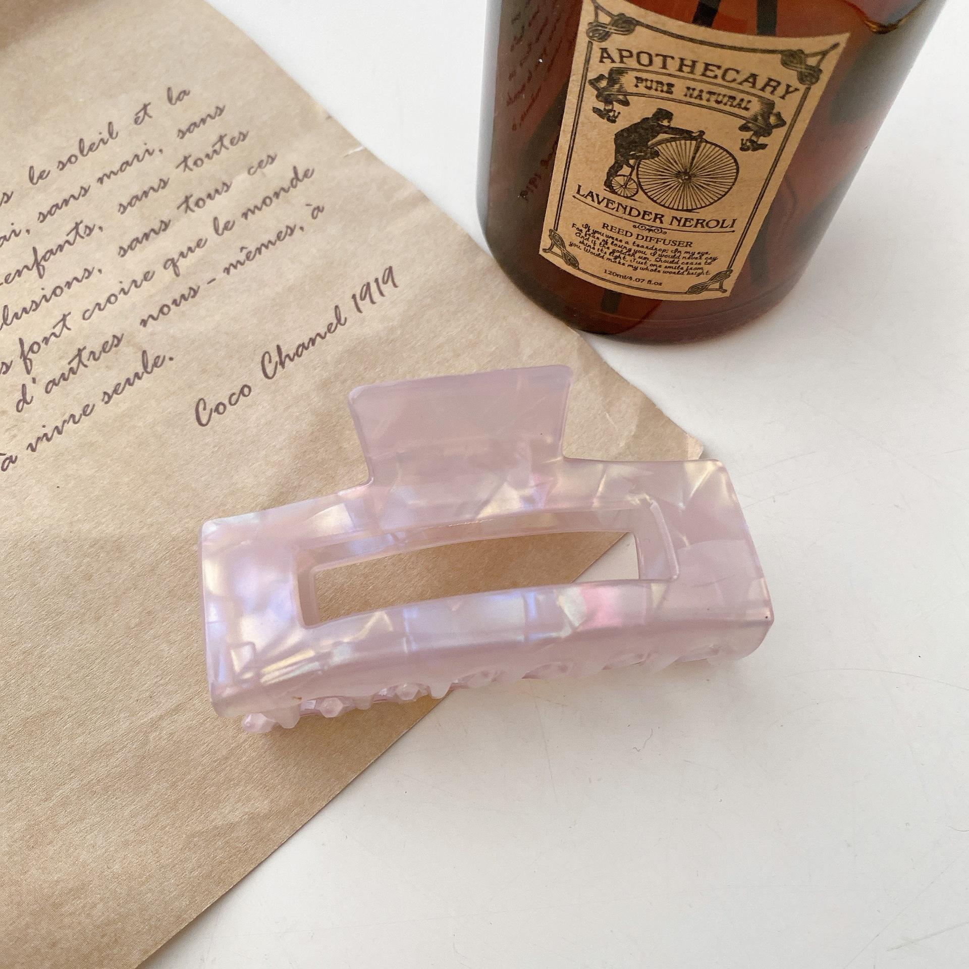 

Trendy Pvc Handcrafted Hair Claw Clip In Soft Blue And Orange Perfect For Fashion Lovers Dreamy Light Purple Square