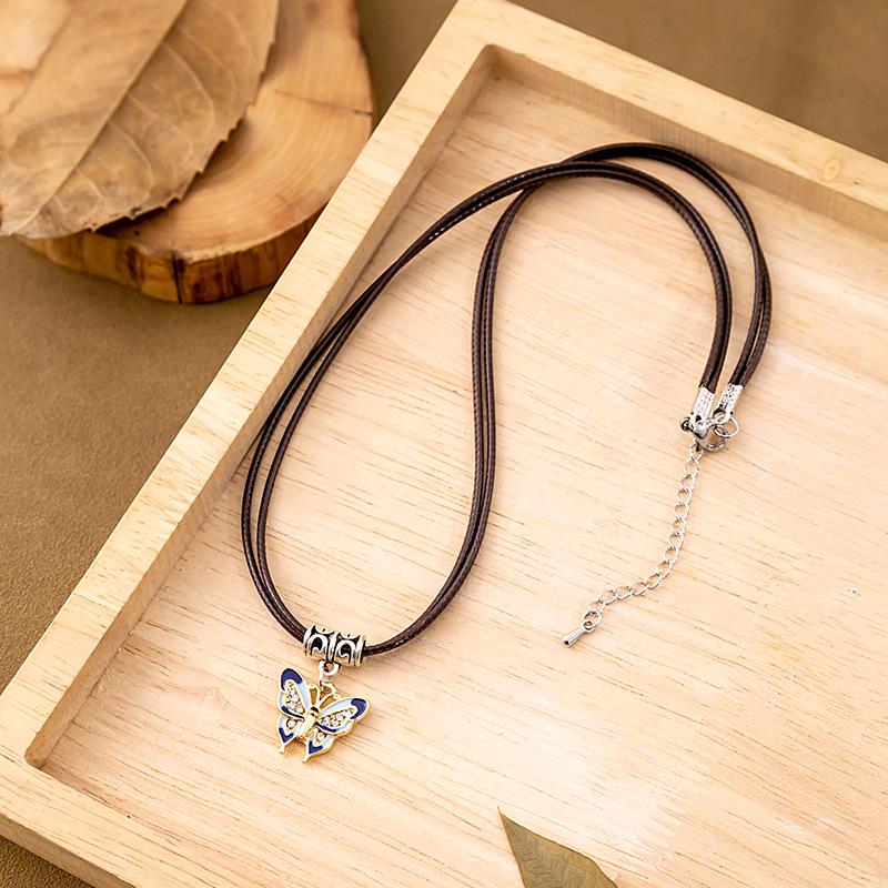 Chinese Ethnic Style Butterfly Necklace - Retro Ceramic Flower Bell & Peace Lock Ornament for Women