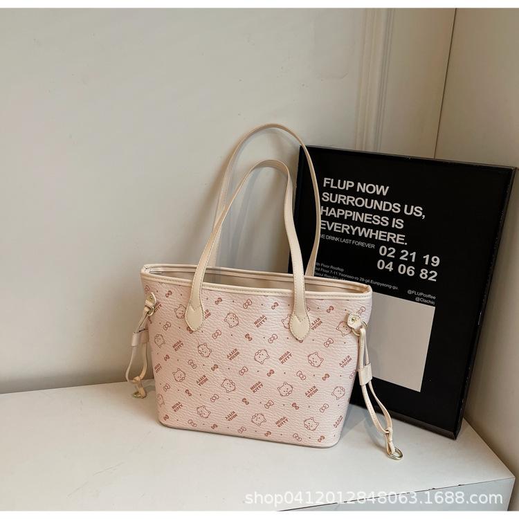 

Сумка большой вместимости женская весна 2025 новая повседневная модная сумка через плечо с принтом нишевый дизайн классическая сумка-тоут бежевый