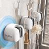 Wall-Mount Suction Cup Mop and Broom Holder with Hook - No Drilling Needed
