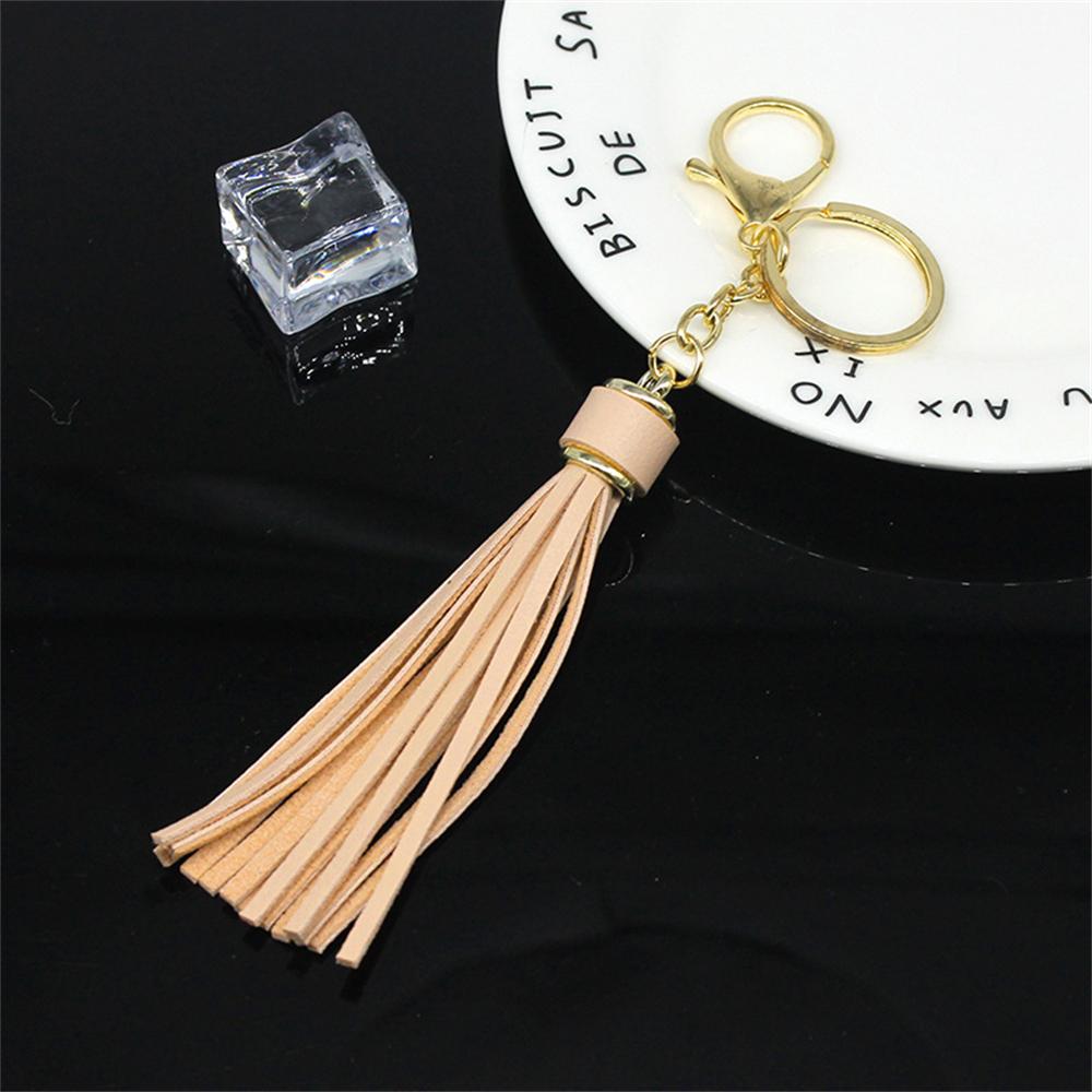 Модный простой кожаный брелок с кисточками для женщин — фото 11