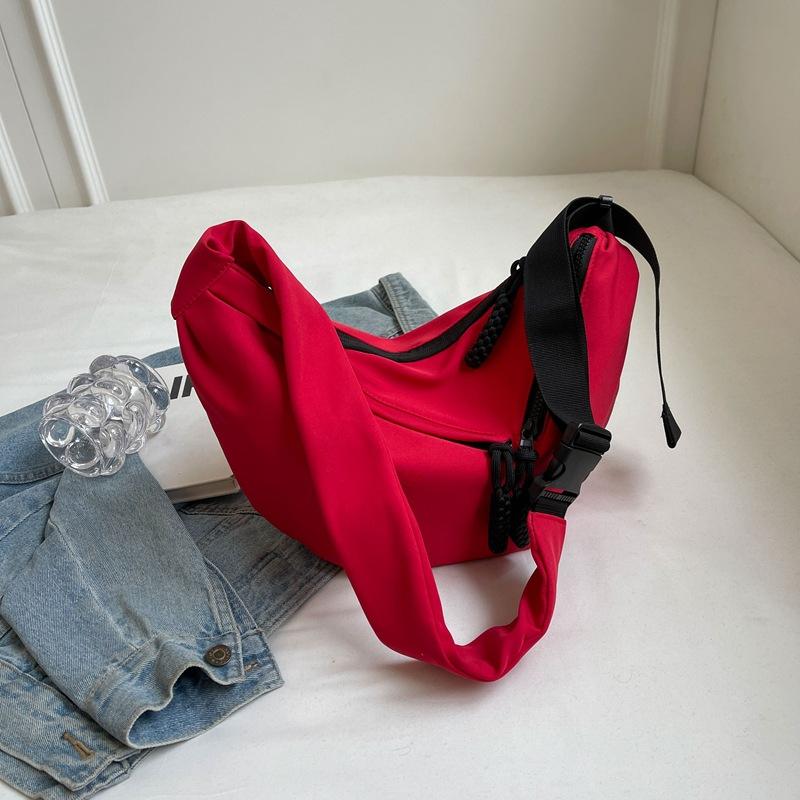 Large capacity bag women 2025 new shoulder bag casual Korean version solid color messenger bag trendy student personalized dumpling bag