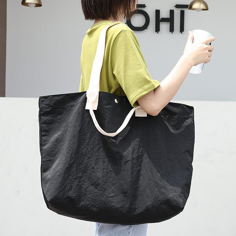 IELGY Korean version of casual large-capacity nylon handbag, simple literary Mori canvas bag