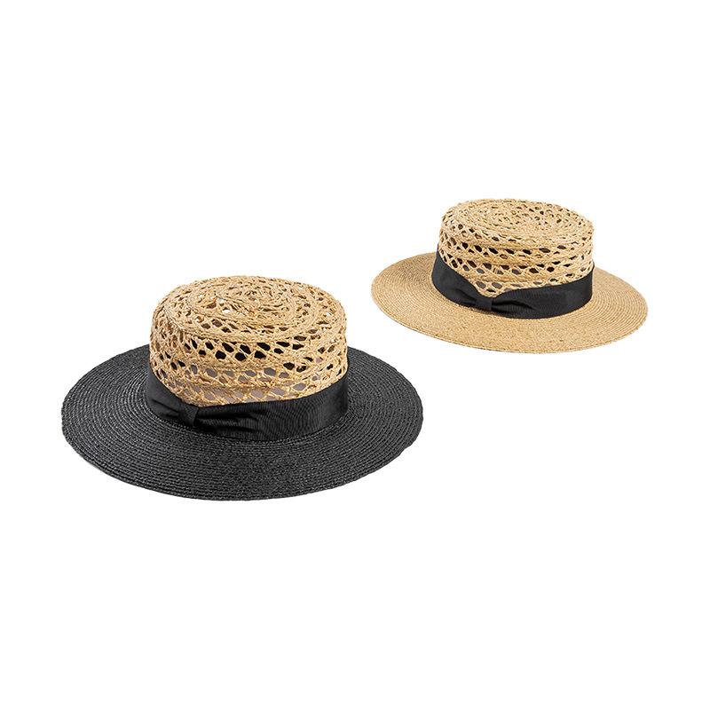 Spring and summer new fashion casual webbing bow hand-woven hollow splicing raffia flat top hat sunshade straw hat tide
