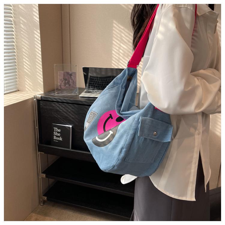 2024 New Korean Style Women's Denim Crossbody Bag: Artistic Smiley Face Canvas with Wide Shoulder Strap