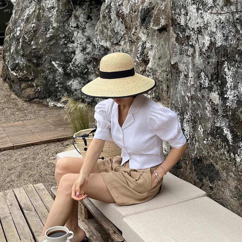 Big brim black hemmed straw straw straw hat women's summer dome retro French elegant Hepburn big edge woven hat
