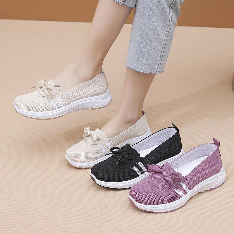 Women's new flying woven fabric surface breathable one-pedal lazy shoes shallow mouth soft sole comfortable and light casual flat-soled single shoes