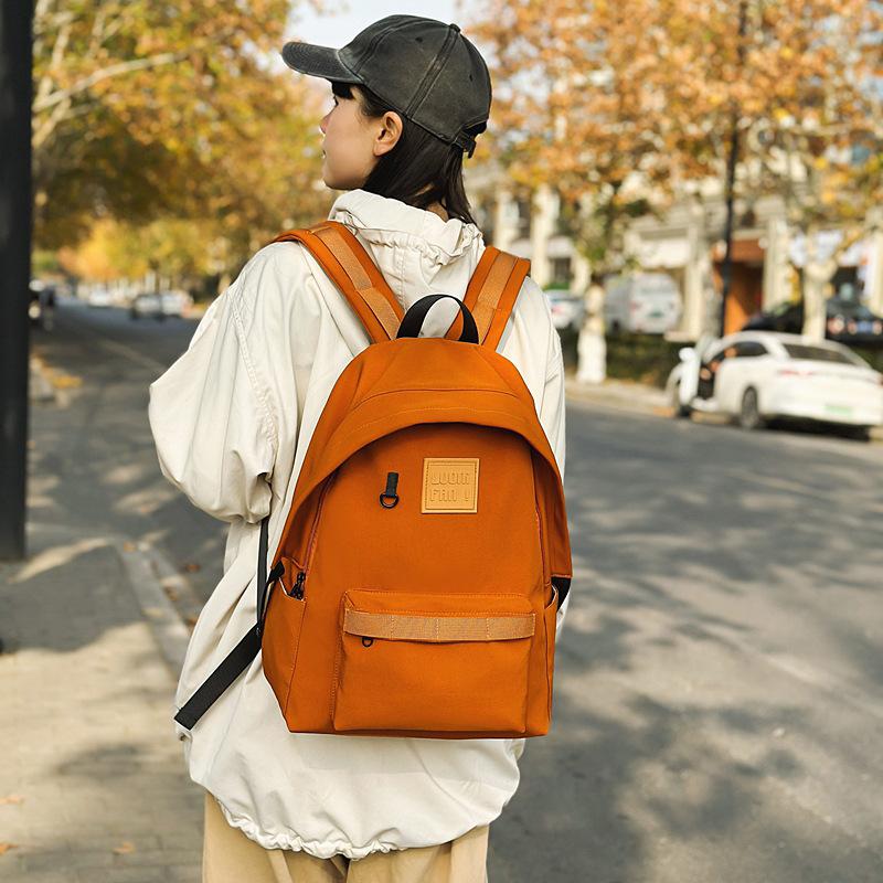 Nylon backpack female Korean version student schoolbag large capacity outdoor tide high school backpack high value backpack large оранжевый