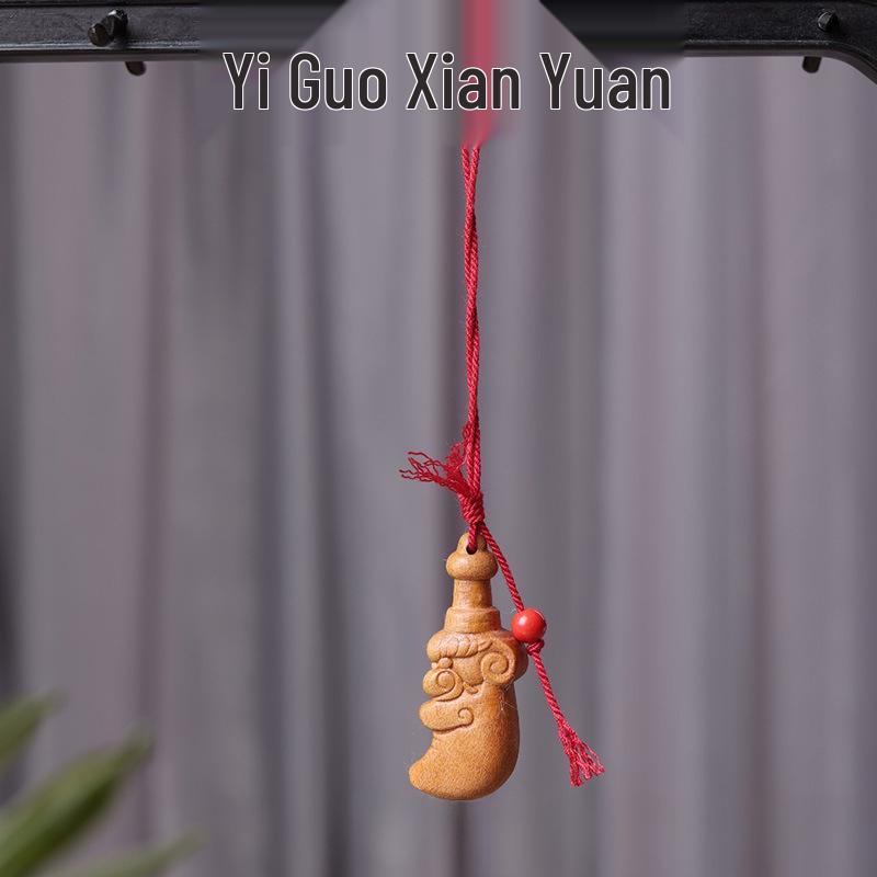 

Jujube Wood Bagua Sword Charm - Carved Ornament for Phone, Bag, or Keychain Approx. 4.8*2cm