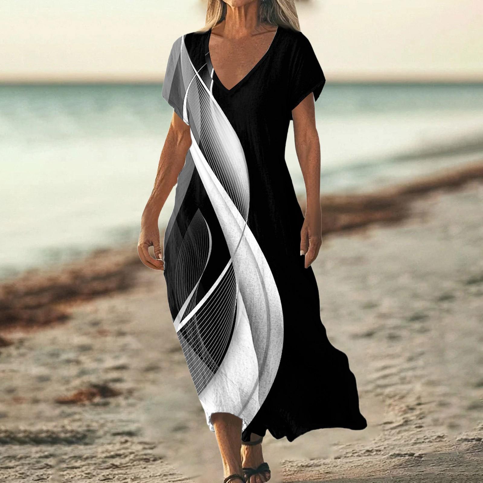 

Модний жіночий літній пляжний сарафан з V-подібним вирізом, коротким рукавом та квітковим принтом XXL чорний