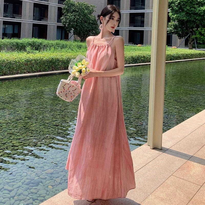 Seaside vacation pink sleeveless suspender dress loose lazy wind summer new sweet and spicy skirt women