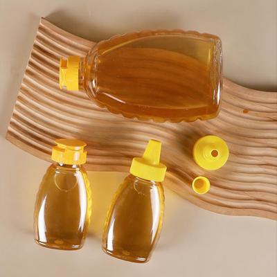 Transparent Reusable Plastic Honey Bottles Squeeze Honey Bottle Container Holder With Lid For Storing And Dispensing Honey Jar