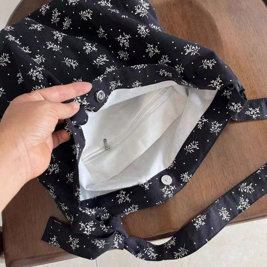 Niche versatile canvas bag shoulder messenger bag black floral printed bag for women