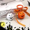 Pumpkin Bell Keychain with Bow Halloween Keychain, Hollow Head Key Ring Ribbon Bow, Backpacks Charm for Holiday Party Decoration Creepy