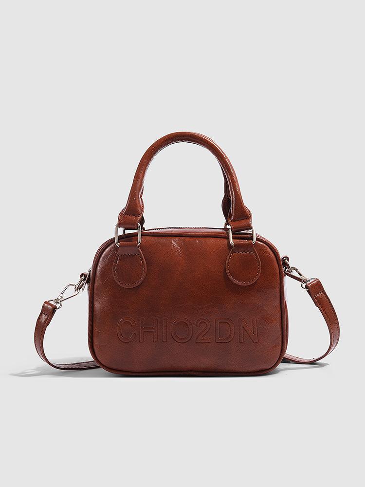 

Korean niche portable bowling bag women s 2025 new trendy retro small square bag versatile ins oblique span bag коричневый