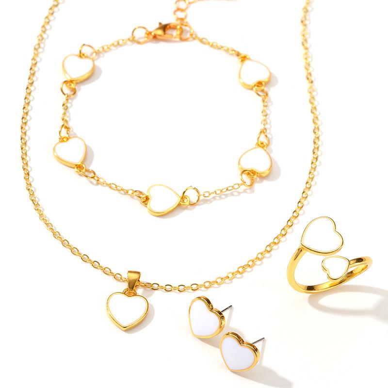 Heart-shaped Jewelry Set, Fashionable and Romantic, Exquisite Asymmetrical Love Heart Pendant, Four-piece Set of Jewelry.