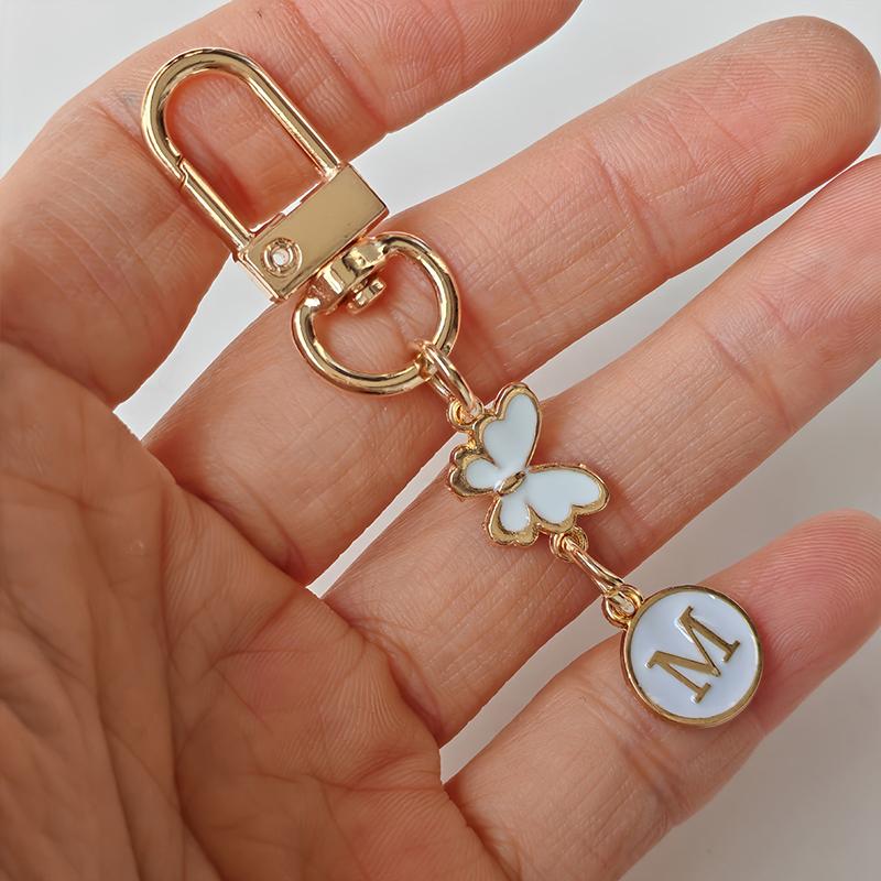 

1 шт. Брелок для ключей, Спутник ключа от машины, Металлический брелок, Монограммный шарм, Подвеска для сумки, Легкий, Брелок с монограммой бабочки, Долговечность, Логотип ключа