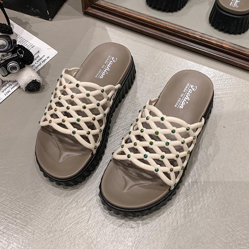 

2025 европейская и американская пляжная обувь на плоской подошве весна-лето 2025 новые модные полые классные тапочки тапочки на толстой подошве женские 35