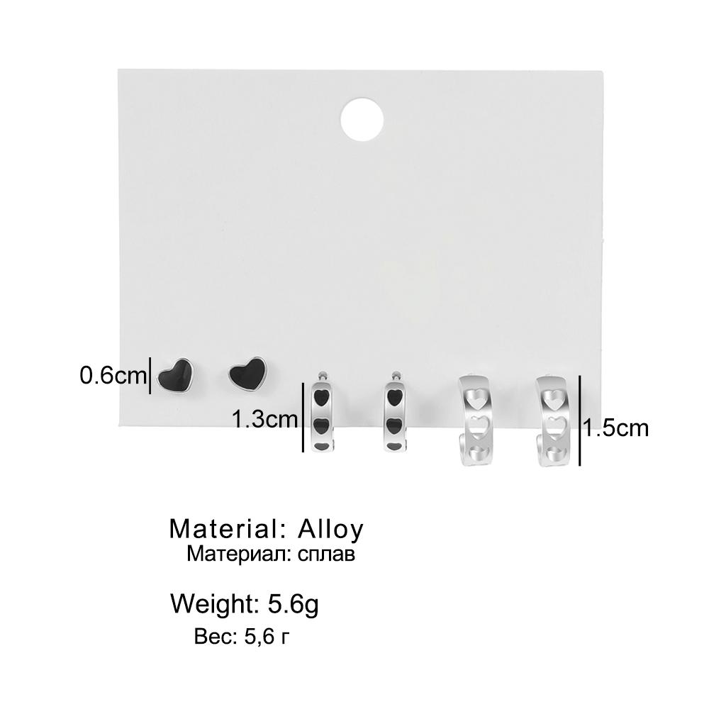 Boucles d'oreilles simples d'amour Mode Femme Ensemble de boucles d'oreilles Écossais noir et blanc Creux Élégant Exquis Bijoux Boucles d'oreilles Tempérament Charme Boucles d'oreilles fille