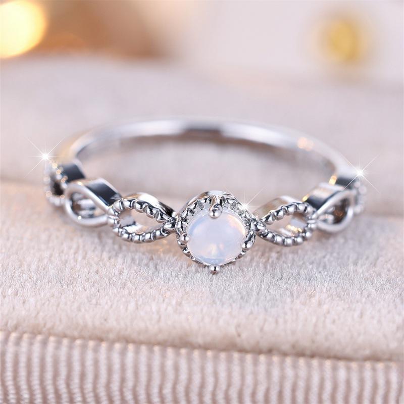 Four-claw round hollow water drop ring, simple personality niche light luxury ring no. 5