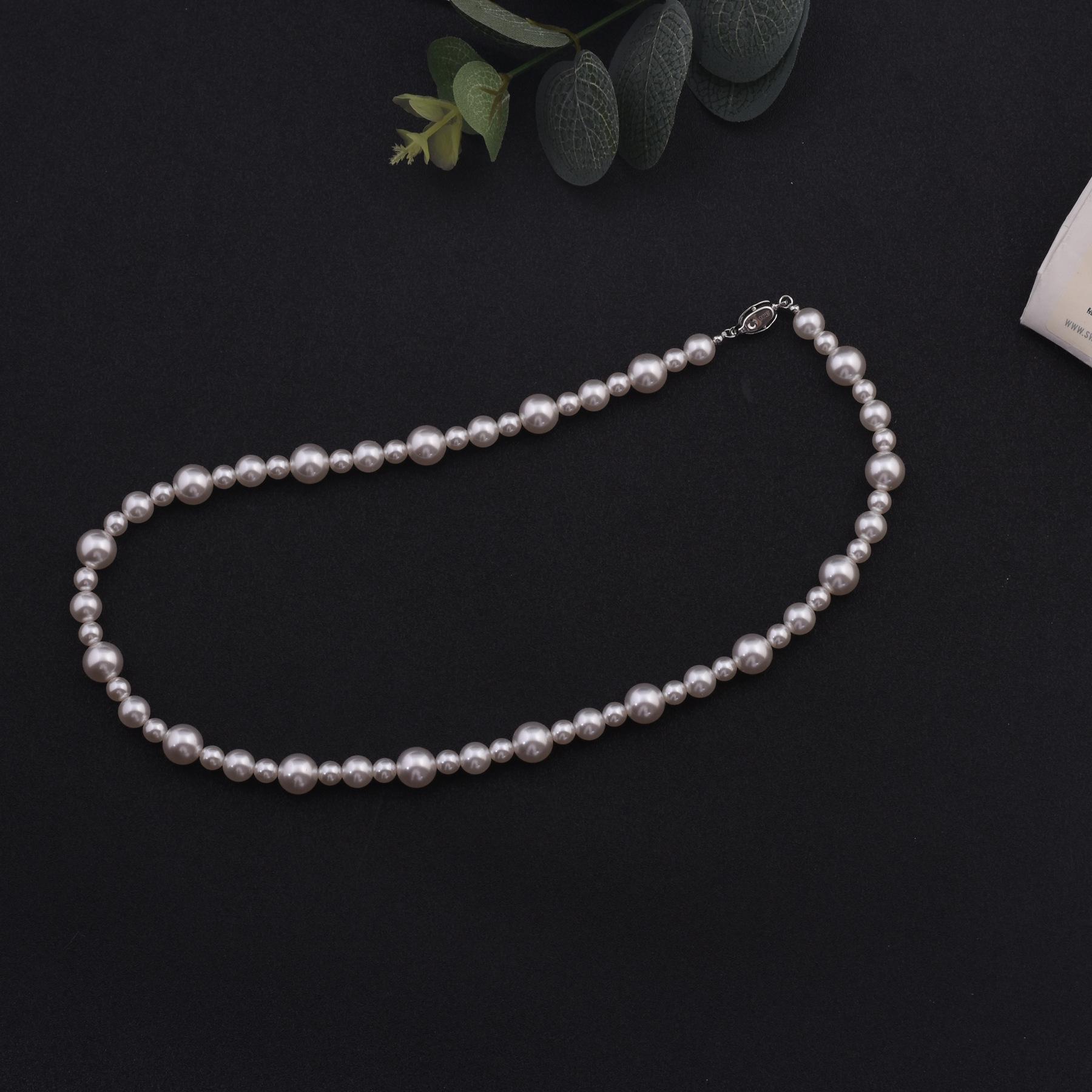 

Элегантное многослойное колье-чокер из нерегулярного жемчуга во французском стиле