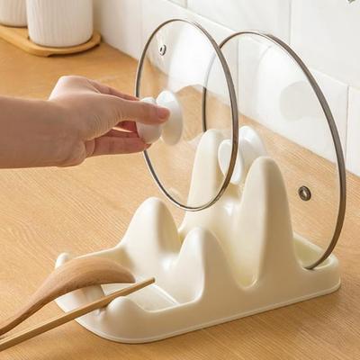 Articoli per la cucina – Poggia mestoli e clip per pentole