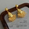 Medieval vintage earrings retro hammer pattern hollow relief gold and silver geometric niche light luxury earrings