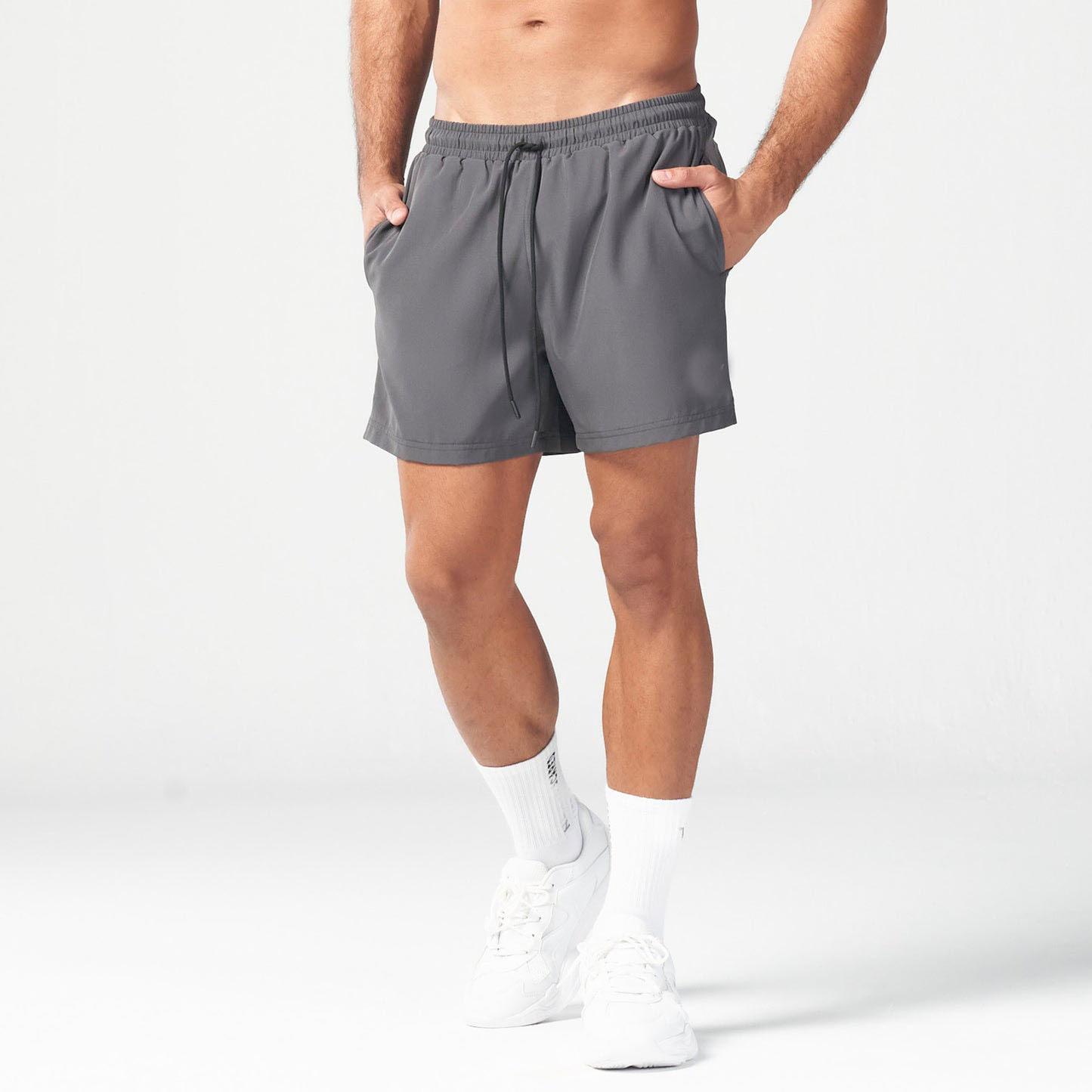 

New Sports Three-point Shorts for Men s Fitness Running Training Casual Quick-drying Beach Shorts Summer XXL темно-сірий колір