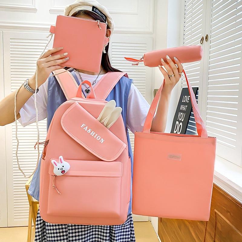 New girl backpack, primary and secondary school schoolbag, make-up bag, four-piece rabbit ear class backpack