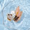 Gold Tone Alloy Fish Brooch Pin with Rhinestones and Pearl Accent for Women Suitable for Blazers Cardigans and Outerwear Accessories