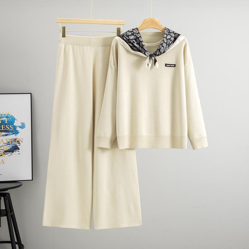 A Two-piece Sweater Set for Women, Featuring A Laid-back Style, Round-neck, Long-sleeved, Loose Knitted Top and High-waisted Wide-leg Pants