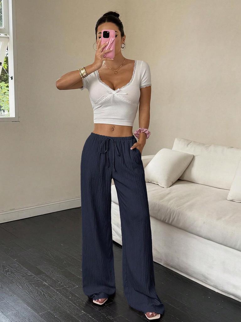 2026 Women's Casual Wide-Leg Pants with Knot Waist and Textured Fabric
