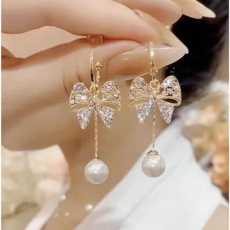 

Temperament Full Diamond Bow Pearl Fringed Earrings Niche Design Fashion Versatile Earrings Light Luxury Premium Earrings жёлтый