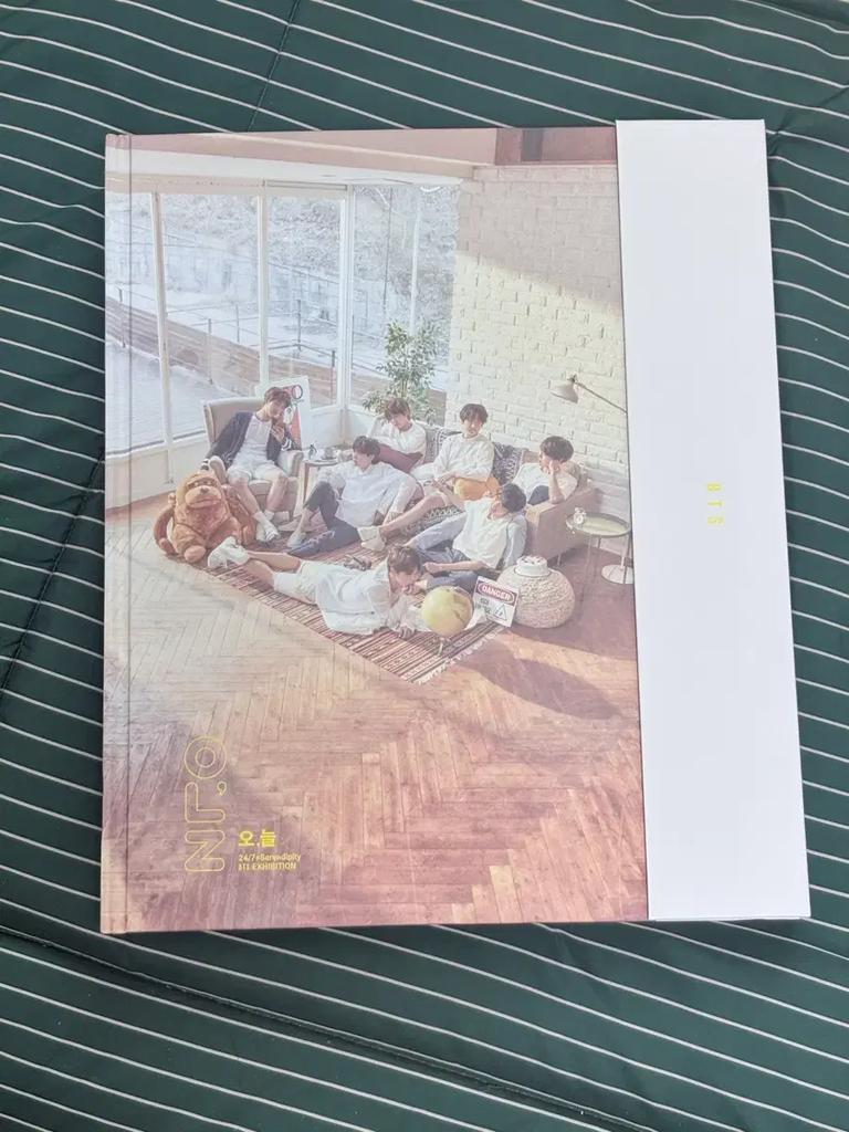 BTS merchandise, including photo albums and postcards, will be on display today.