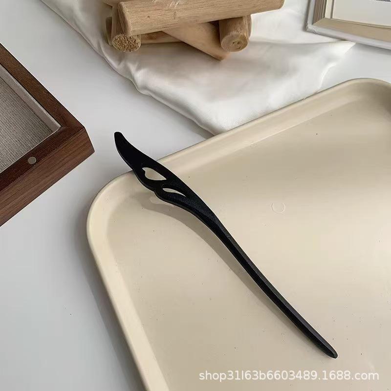 

Элегантная шпилька из черного дерева: Современная простота в сочетании с древним китайским стилем 24