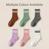 Women's Custom Embroidered Logo Pilates Reformer Socks Knitted Yoga Socks Grip for Autumn Season Crew High Logos Cuff Bottom
