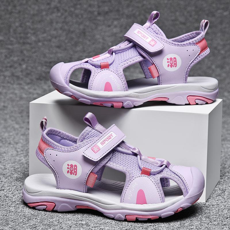 Jungensandalen 2025 Sommer neue Mittel- und ältere Kinder rutschfeste weiche Sohle Kindertasche Kopf Strandschuhe Mädchen Funktionsschuhe
