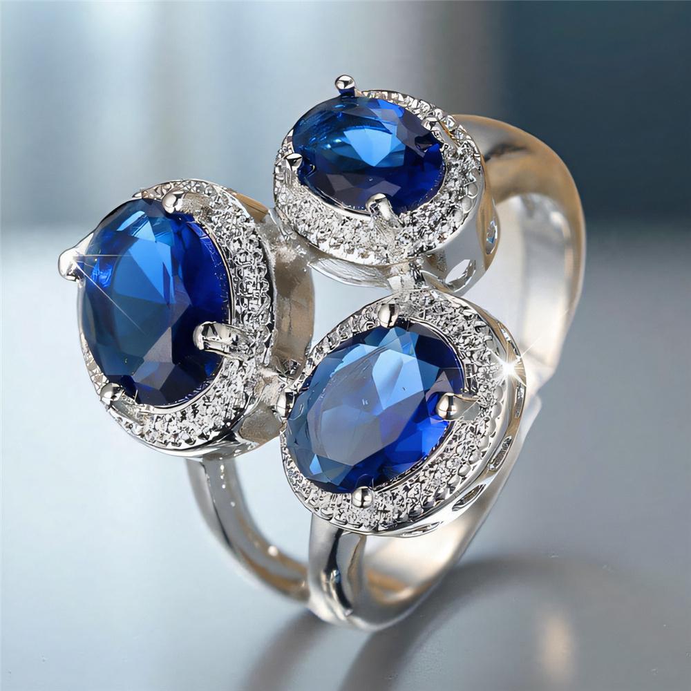 Süße Damen blaue Zirkonstein Silberfarbe Hochzeit Versprechen Verlobung Weizenringe für Frauen