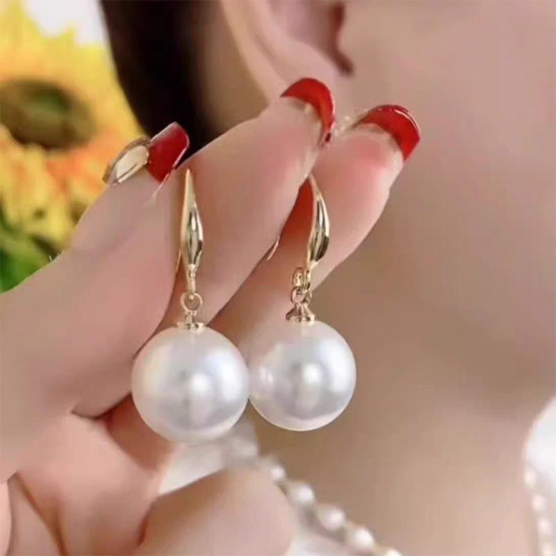 Cercei lungi cu perle de lux cu lumină roșie 2024: Modă pentru femei, Stil cu temperament avansat