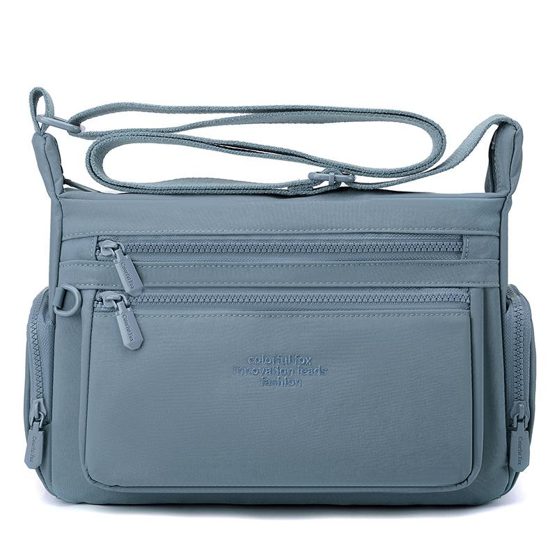 Ny dam stor kapacitet axelväska flerlagers stänkskyddad nylon budväska