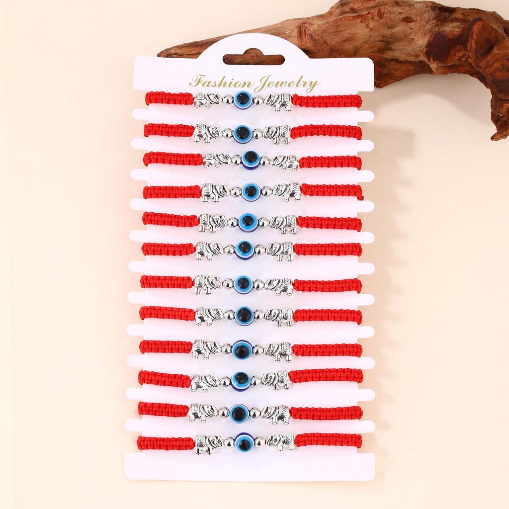 Modrý náramek se zlým okem a červenou šňůrkou - Ručně tkaný design