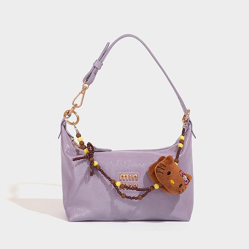 

Модная сумка-багет из кожи с масляной восковой пропиткой для женщин 2025 Новая винтажная универсальная сумка-пельмень на одно плечо Высококачественная текстура Трендовая женская сумка фиолетовый