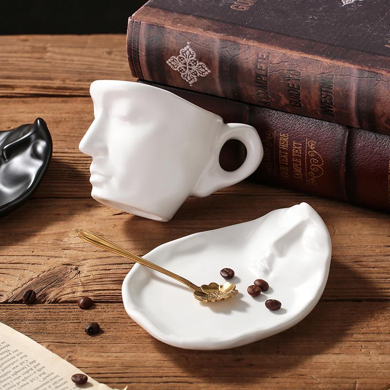 Europäische abstrakte Gesicht Keramik Kaffeetasse mit Untertasse Paar Becher Exquisite Kopf Dessert Teetasse Büro Parodie Becher Wohnkultur