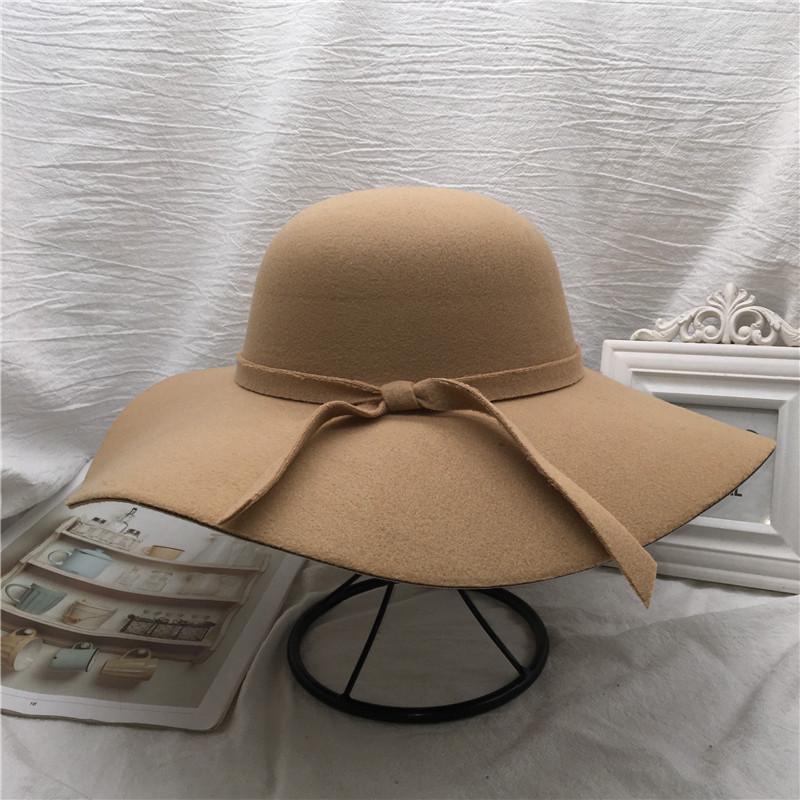 Women's Retro Korean Black Woolen Fisherman Hat with Bow and Large Brim – Perfect for Autumn and Winter.