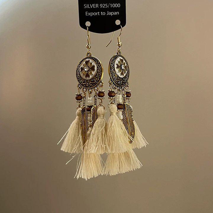 Retro Ethnic Bell Tassel Earrings: Exquisite, Fashionable Dangle Design with Light Luxury Appeal.