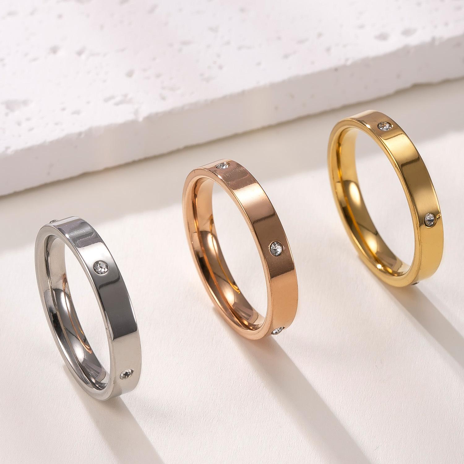 

Titanium Steel Ring Smooth Surface Inlaid Diamond Ring High-end Simple Stainless Steel Jewelry Three-piece Set Wholesale Factory 12No.