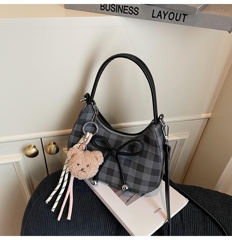 

Niche fashionable bag women s 2025 new bow hand carry crescent bag plaid one shoulder messenger bag dumpling bag women